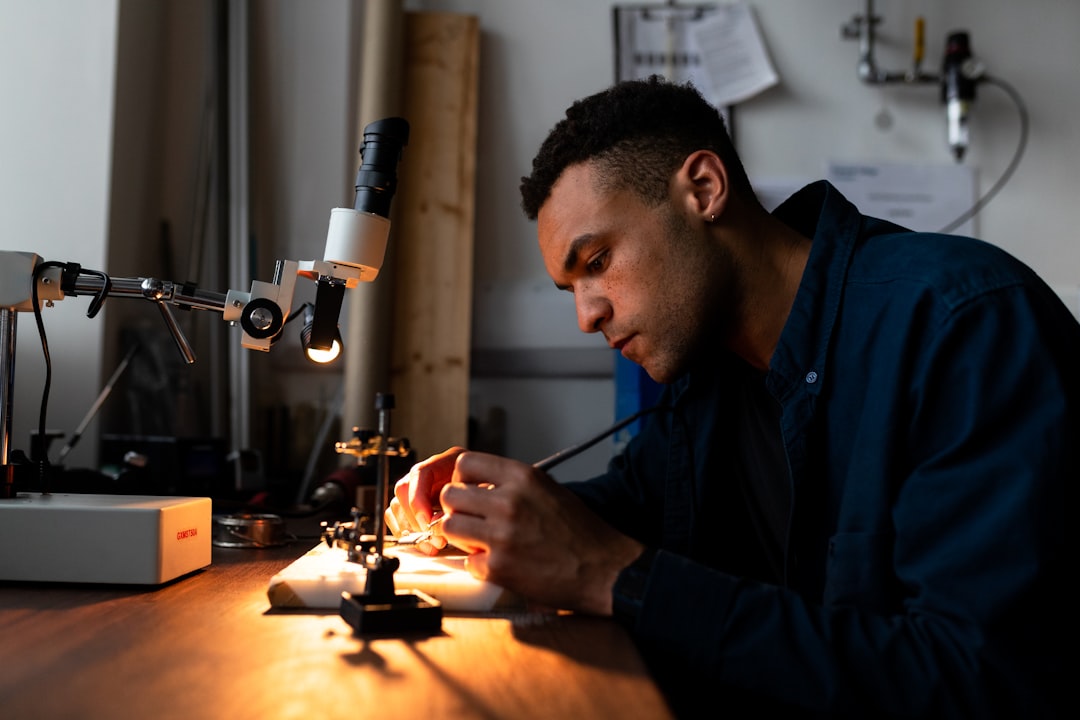 Engineer working with electronic components