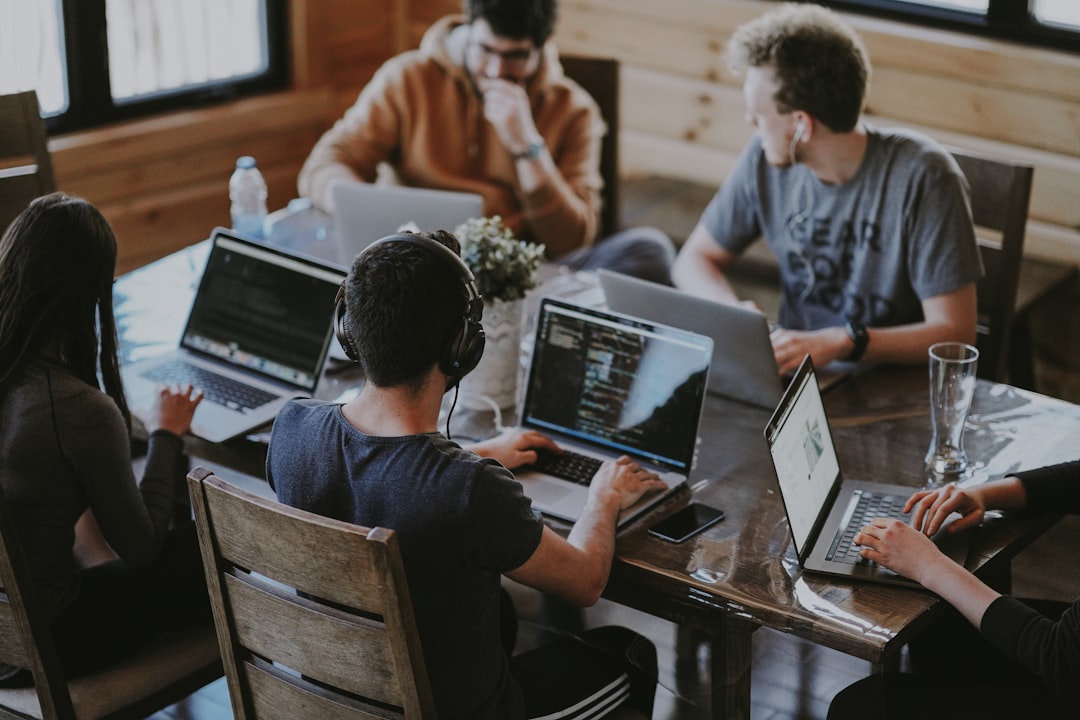 Team collaborating around a work table